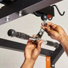Image showing the easy clip removal of a straight bar cable machine attachment
