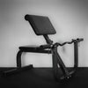 Preacher curl bench with seat and barbell