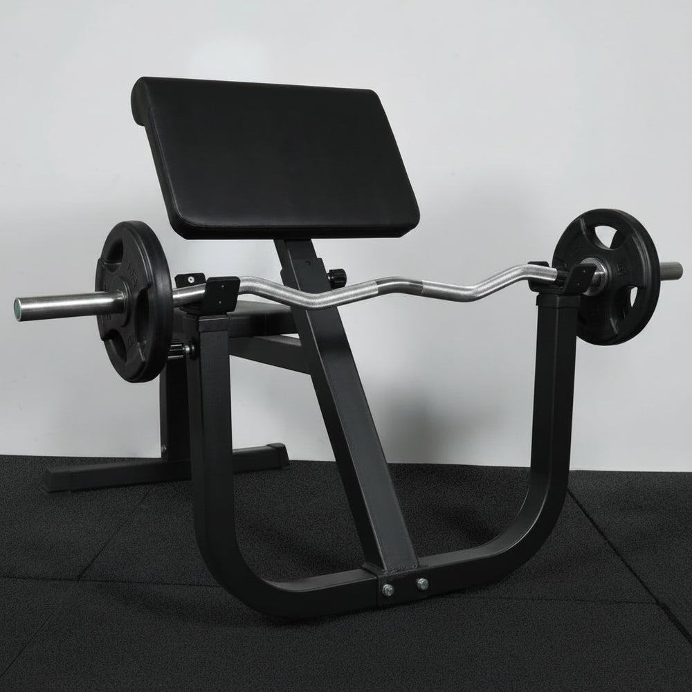 Preacher curl bench with barbell and weights in a gym setting