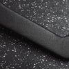 Close up of metal part of cable attachment bar on a dark background