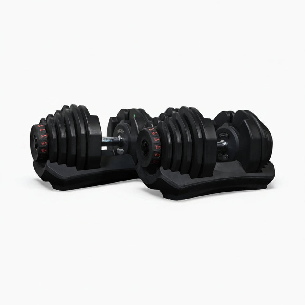 Set of adjustable dumbbells with stands on a white background