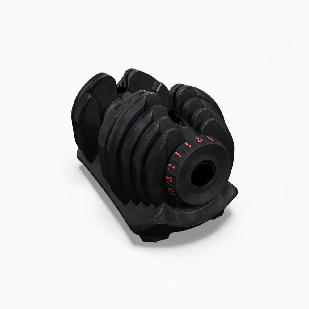 Single dumbbell with adjustable weight system on a white background