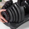 Close up of adjustable weight dial on dumbbell