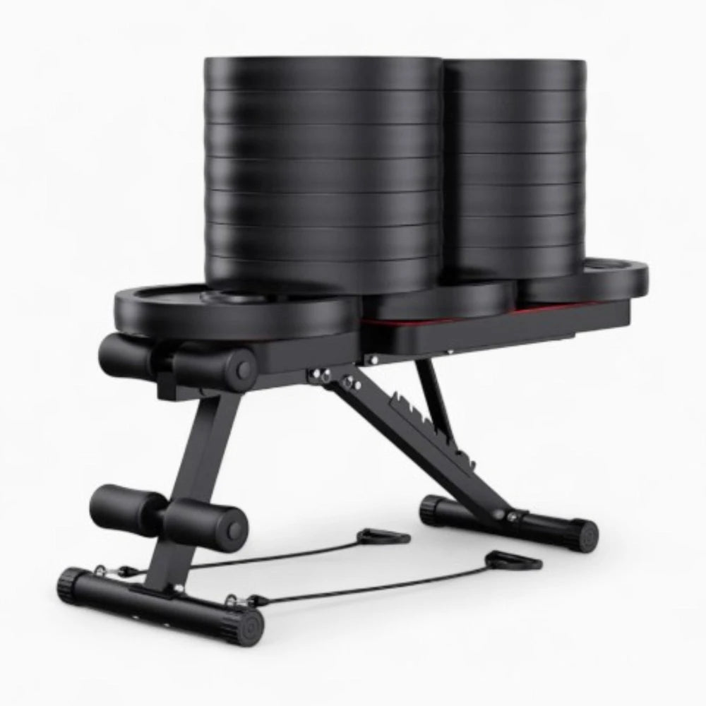 Image showing heavy duty gym bench with stacked weight plates on top