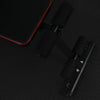 Close up of comfort footrests on a black gym bench