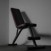 Black adjustable gym bench in home gym setting
