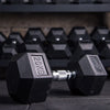 Racks of hex dumbbells with 20kg weight at the front