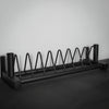 Gym plate weight rack in gym setting