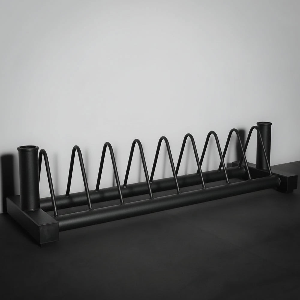 Gym plate weight rack in gym setting
