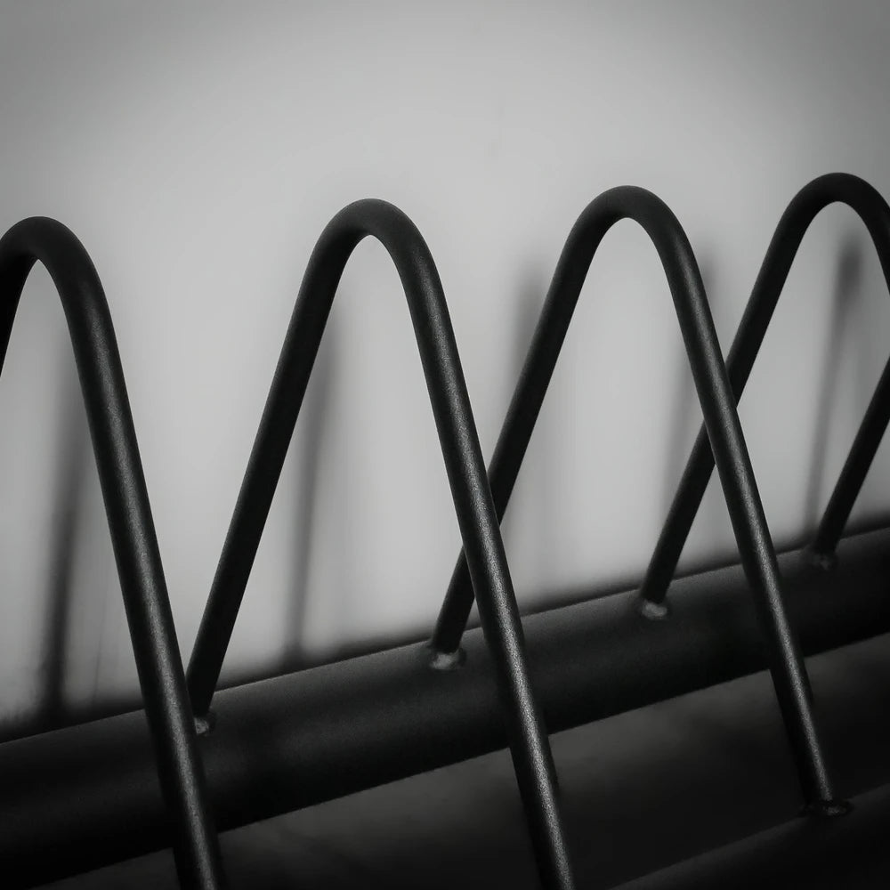 Close up of black weight plate storage rack