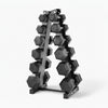 Set of hexagonal dumbbells on a metal rack against a white background