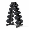Set of black hexagonal dumbbells on a metal stand against a white background
