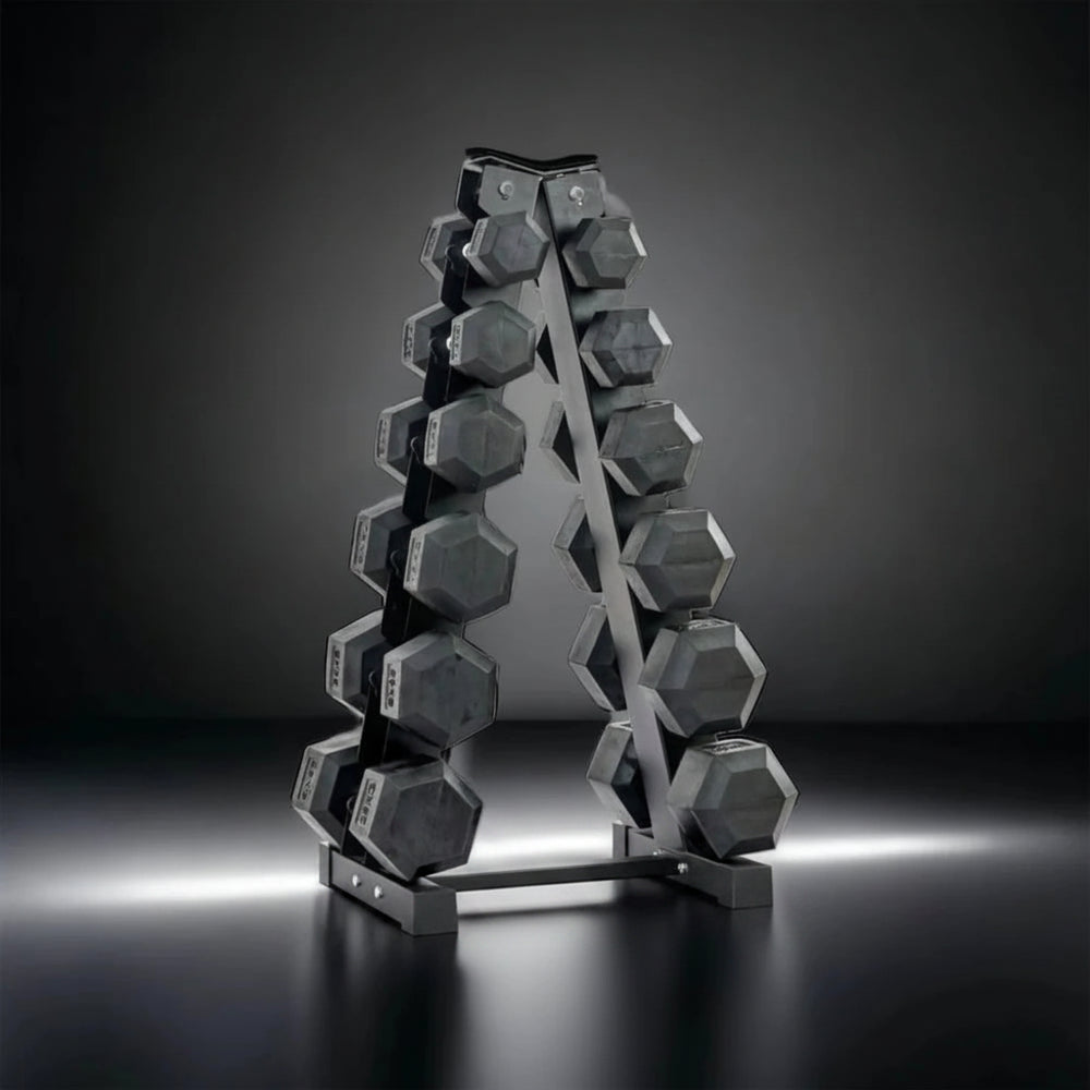 Set of hexagonal dumbbells on a metal stand against a dark background