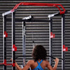 Person using a cable machine in a gym setting