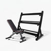 Empty dumbbell rack with gym weight bench on a white background