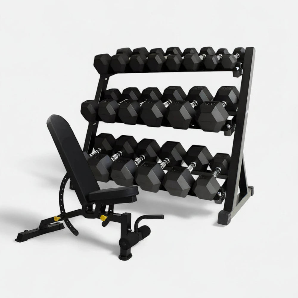 Fully stocked weight rack with gym bench on a white background