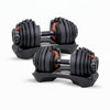 Pair of adjustable dumbbells with different weight settings on a white background