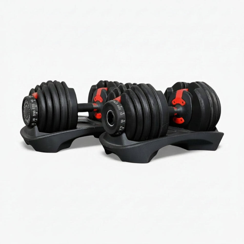Set of black adjustable dumbbells on a white background