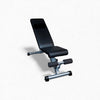 Black adjustable gym bench on a white background