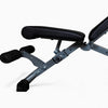 Black and gray adjustable weight bench on a white background