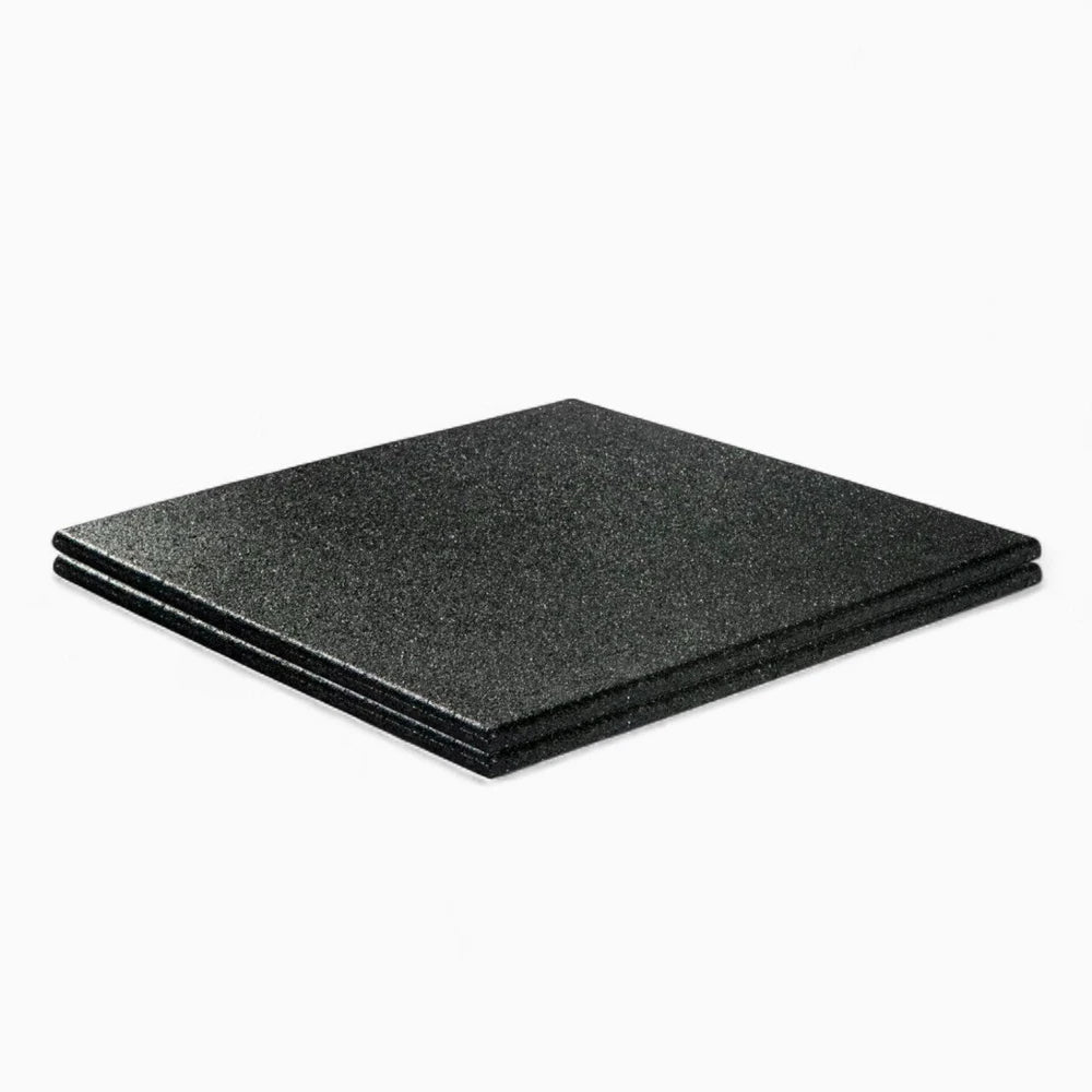 Two heavy duty rubber floor tiles to protect floors from heavy weights