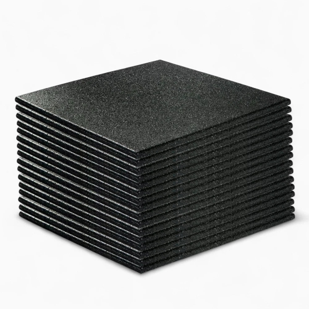Large set of heavy duty floor tiles for commercial and home gyms on a white background