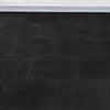 Black tiled gym floor design with white wall