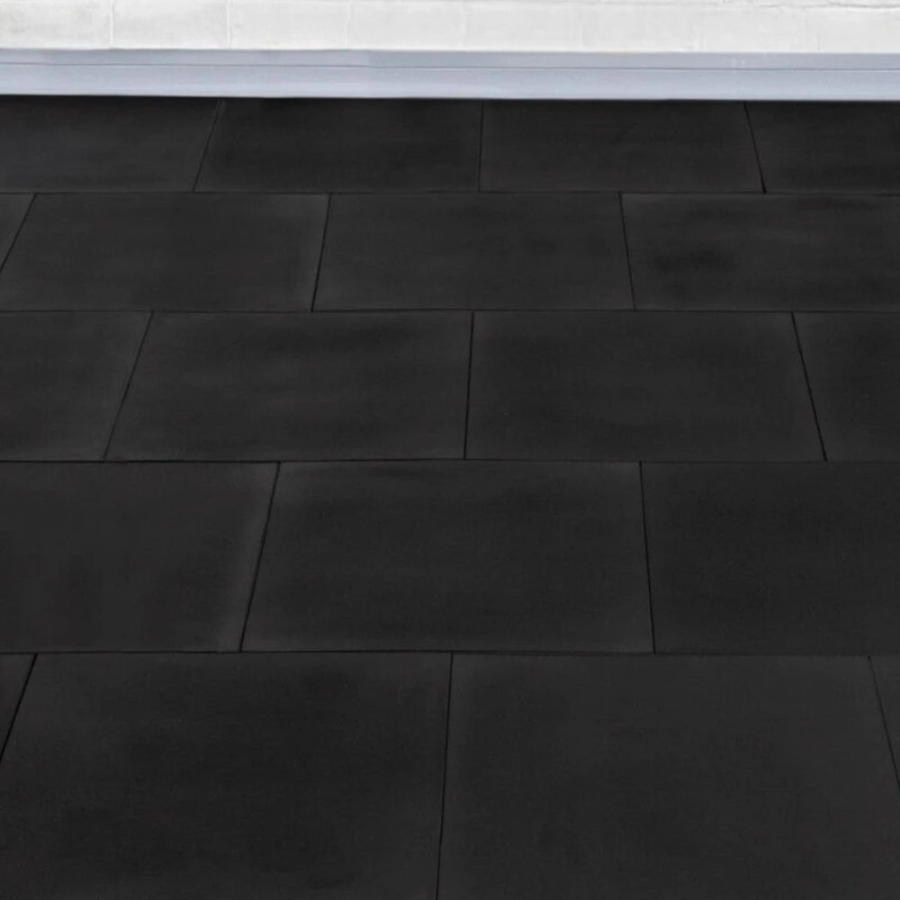 Black tiled gym floor design with white wall