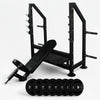 Black gym bench against a steel frame rack with weights on a white background