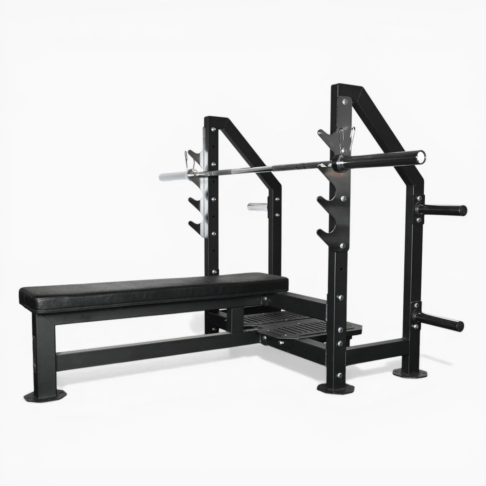 Sideways view of gym bench with barbell on rack above on a white background