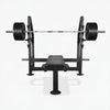 Gym flat weight bench with barbell on a white background