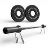 Two black weight plates and chrome barbell on a white background