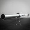Barbell with weight plates on a gray background