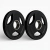Two black weight plates on a white background