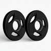 Two black weight plates on a white background