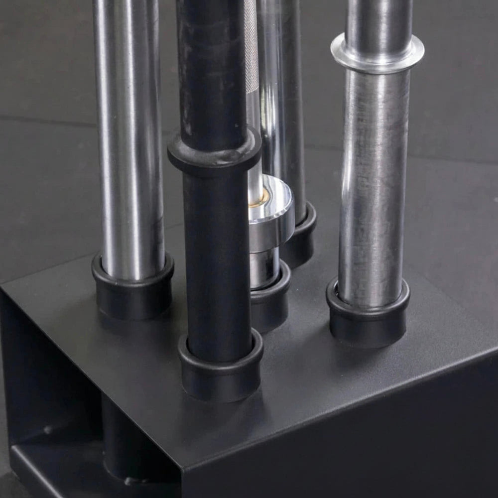 Close-up of a weightlifting bars on a black stand.