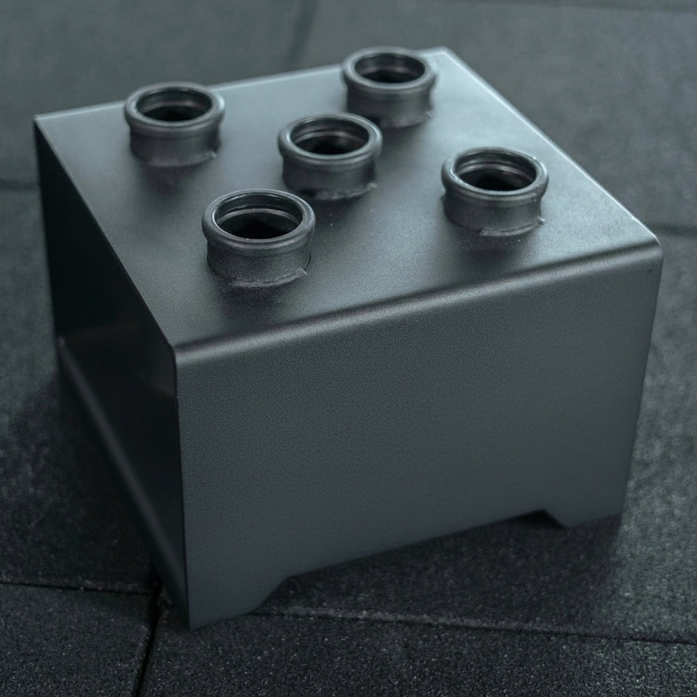 Black container for storing bars on a dark textured surface