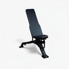 Black weight bench on a white background