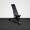 Black gym bench on a gray background