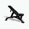 Black adjustable weight bench on a white background