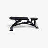 Black adjustable weight bench on a white background