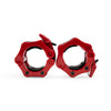 Pair of red clamps on a white background