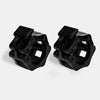 Two black metal fitness barbell collars on a white background
