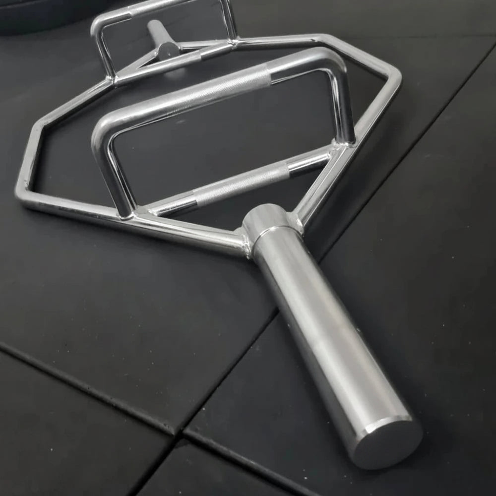 Metallic trap bar on a black surface