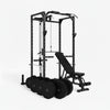 Black fitness power rack with weight plates on a white background