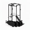 Gym power rack with weight plates on a white background