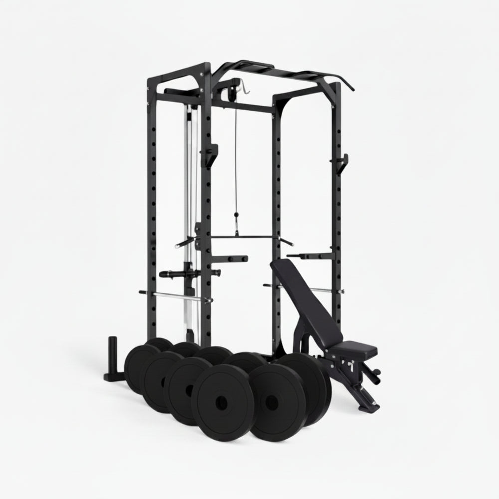 Gym power rack with weight plates and bench on a white background