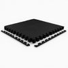 Black interlocking foam mats on a white background