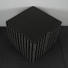 Black foam puzzle mat on a black surface with a white background