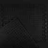 Black textured mat with a geometric pattern on a black background